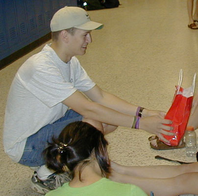 Moo presenting the "gift" to a lucky recipient